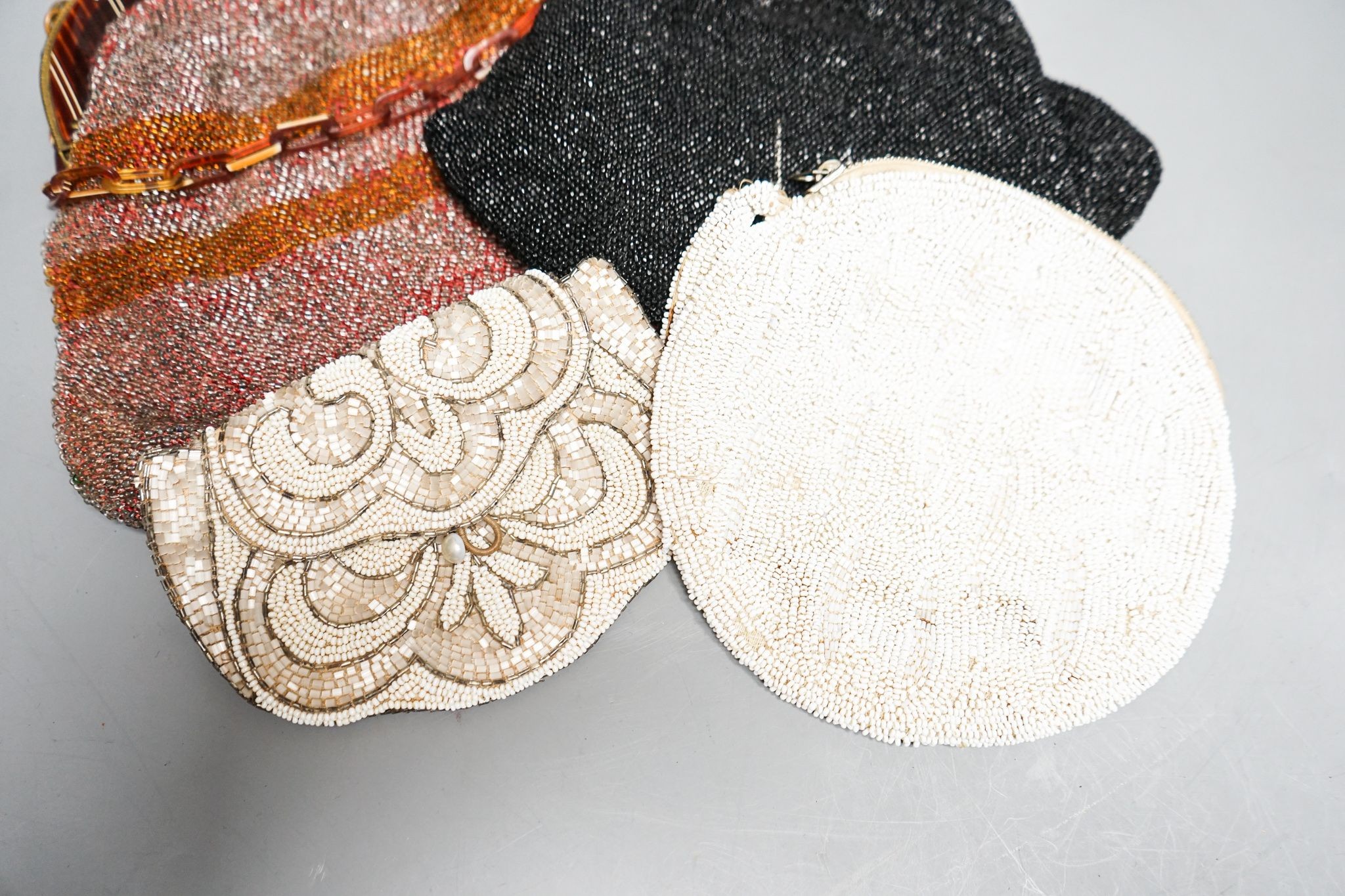 Four evening bags.